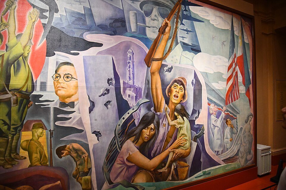 Large colourful mural depicting scenes from Philippine history inside the National Museum of Fine Arts in Manila