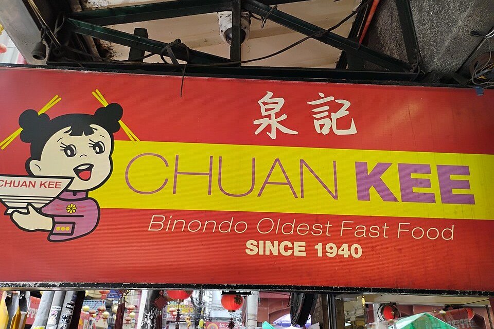 Colorful Chuan Kee restaurant sign in Binondo, Manila, advertising its history since 1940